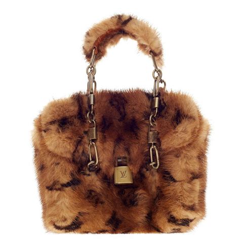 lv mink papillon bag 2003|Louis Vuitton Pre.